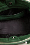 Close-up of a green bag with a textured interior