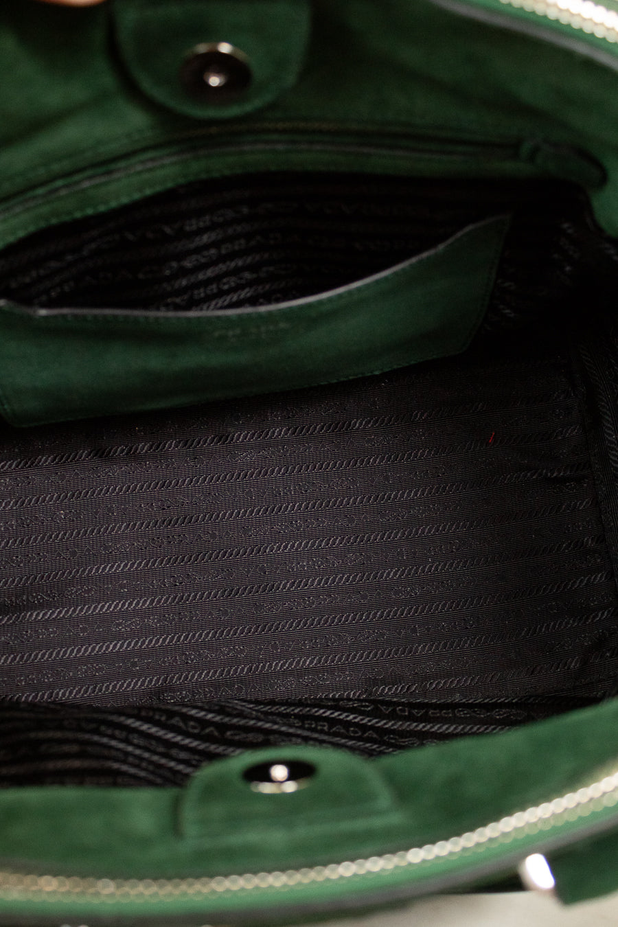 Close-up of a green bag with a textured interior