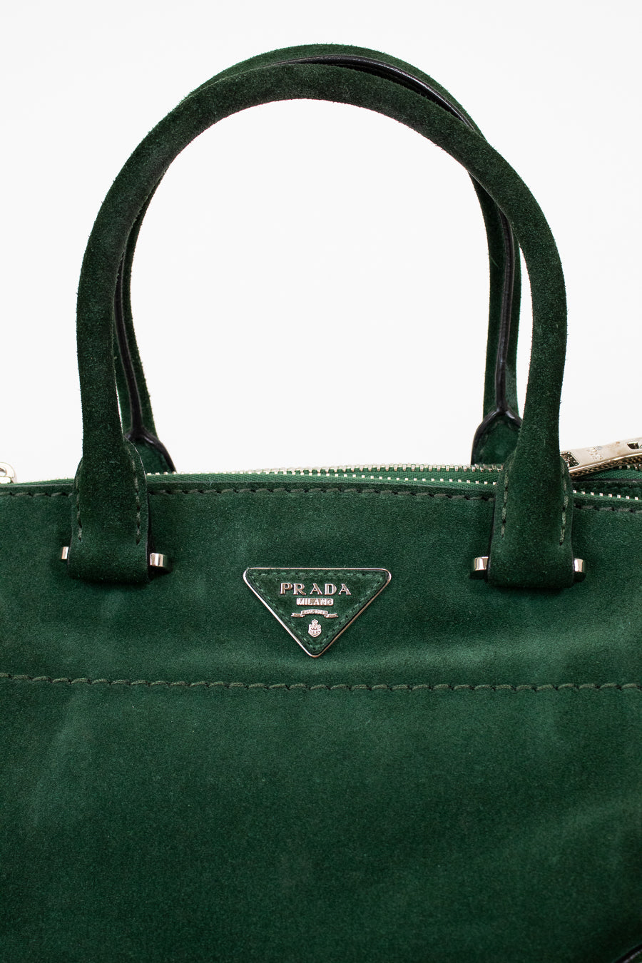 Green Prada handbag with a clear background
