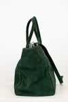 Green backpack on a white background