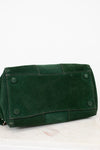 Green leather bag on a white background