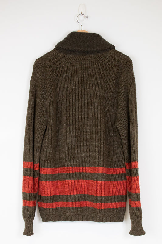 Brown sweater with orange stripes on a white background