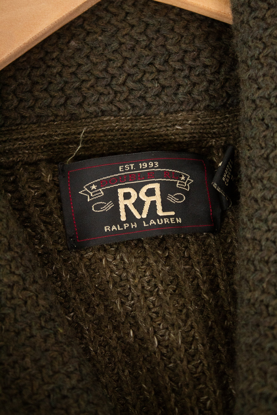Close-up of a Ralph Lauren label on a textured fabric background
