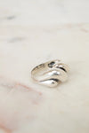 Silver ring on a marble surface