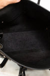 Close-up of a black interior of  handbag 