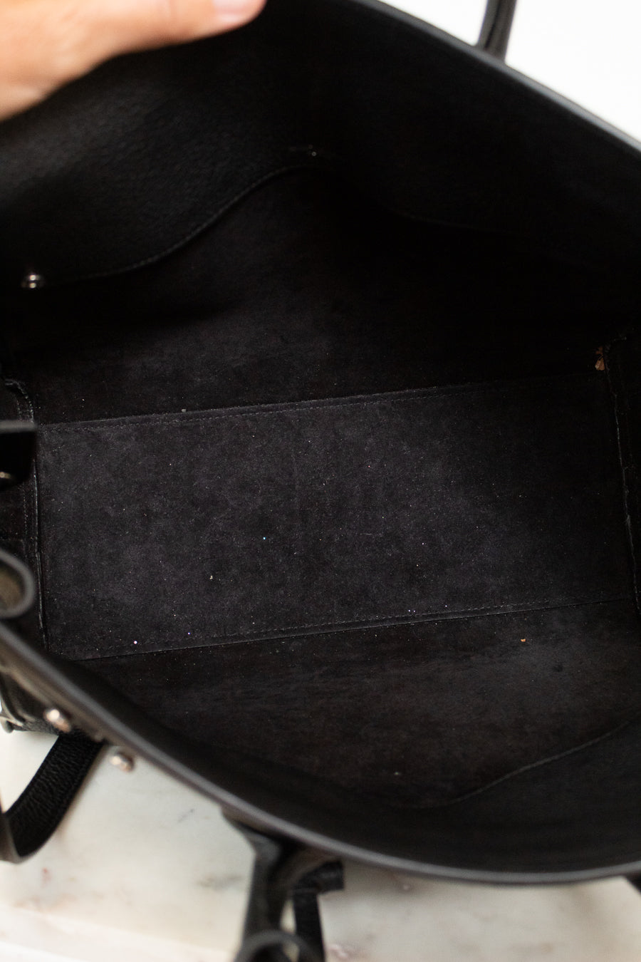 Close-up of a black interior of  handbag 
