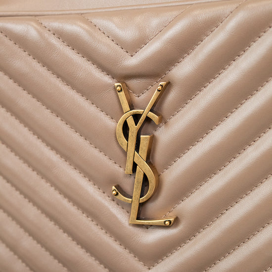 Beige quilted handbag with gold logo on a white background