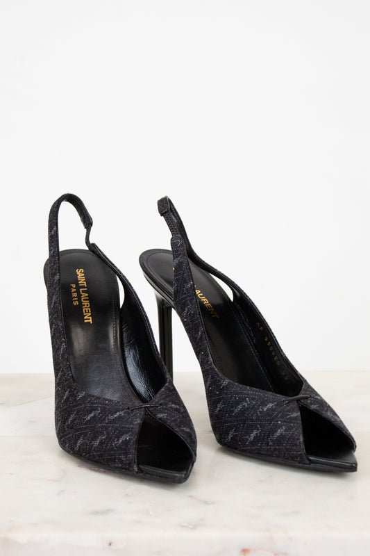 Black printed slingback heels with gold logo on sole
