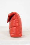Red leather pouch on a white background
