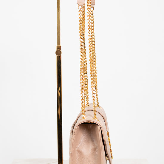 Beige handbag with gold chain strap on a white background