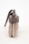 Small pouch with a strap on a white background