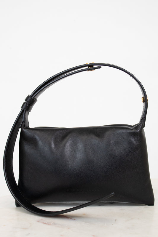 Black handbag on a white background