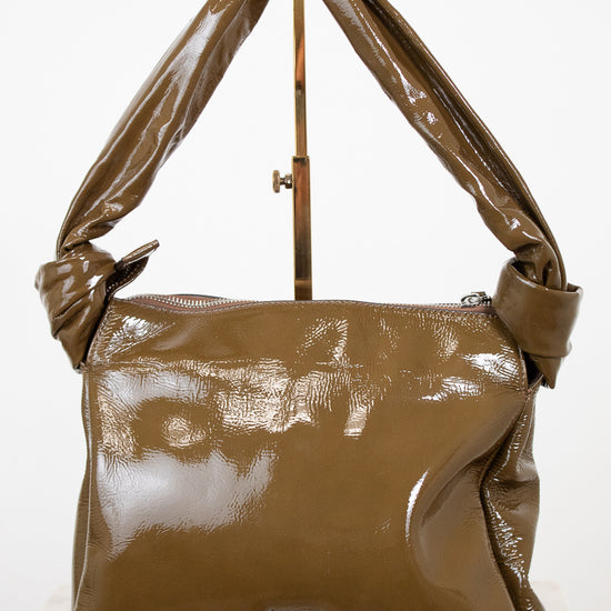 Olive handbag on a white background