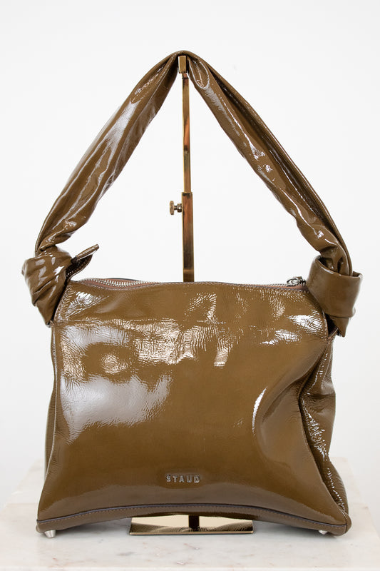 Olive handbag on a white background