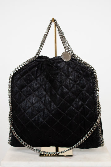 Black quilted handbag with chain details on a white background
