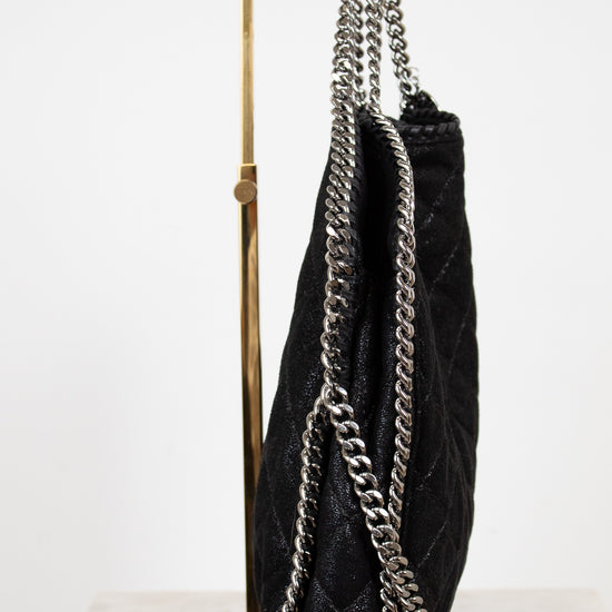 Black handbag with silver chain detail on a white background