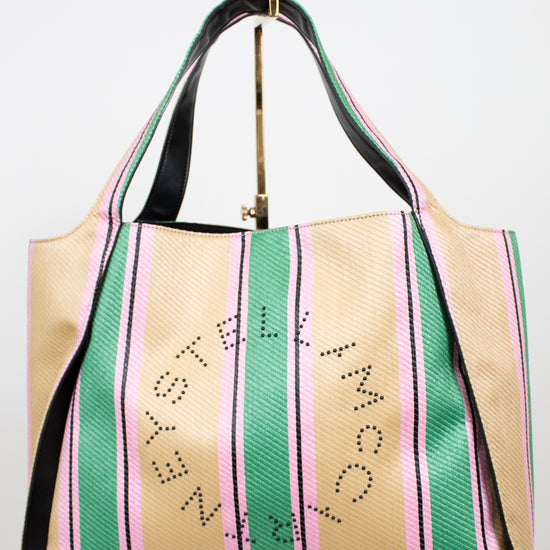 Striped handbag with 'Stella McCartney' branding on a white background