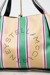 Striped handbag with 'Stella McCartney' branding on a light background