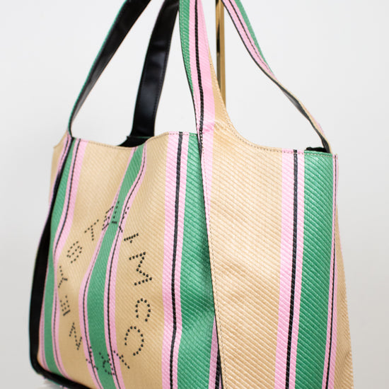 Straw bag with colorful stripes and text on a white background