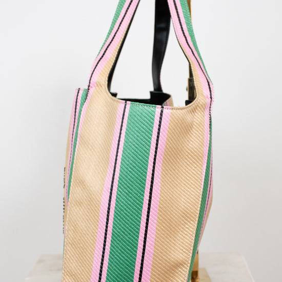 Tote bag with green and pink stripes on a white background