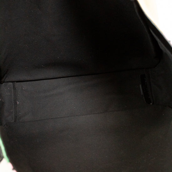 Close-up of a black interior of bag on a white background