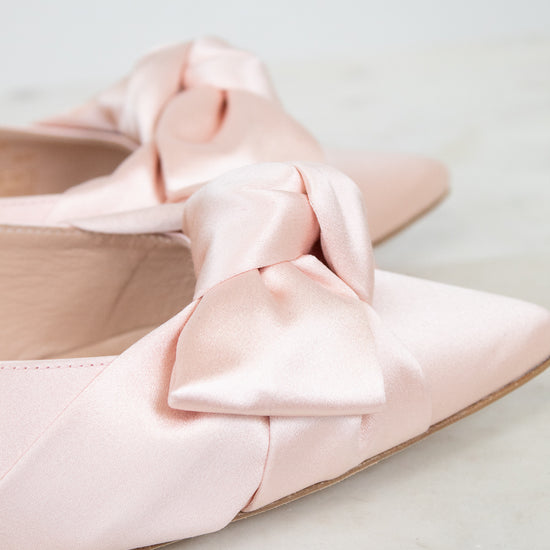 Close-up of satin bow on shoes