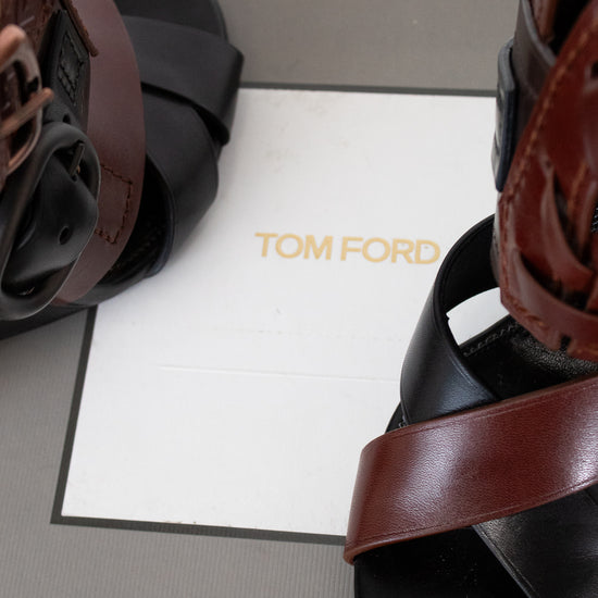 Brown and black sandals on a Tom Ford branded box
