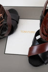 Brown and black sandals on a Tom Ford branded box