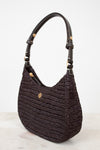 Brown textured handbag with gold accents on a light gray background