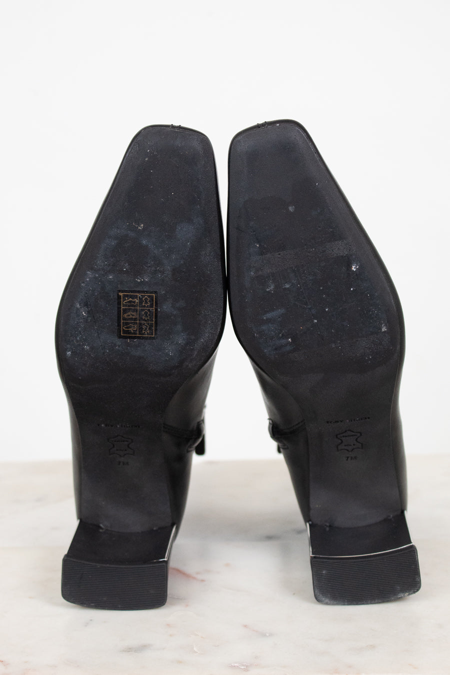 View of the bottom of outer soles of shoes