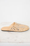 Beige slipper with studded embellishments on a white background
