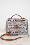 Multicolored woven handbag with a chain detail on a white background