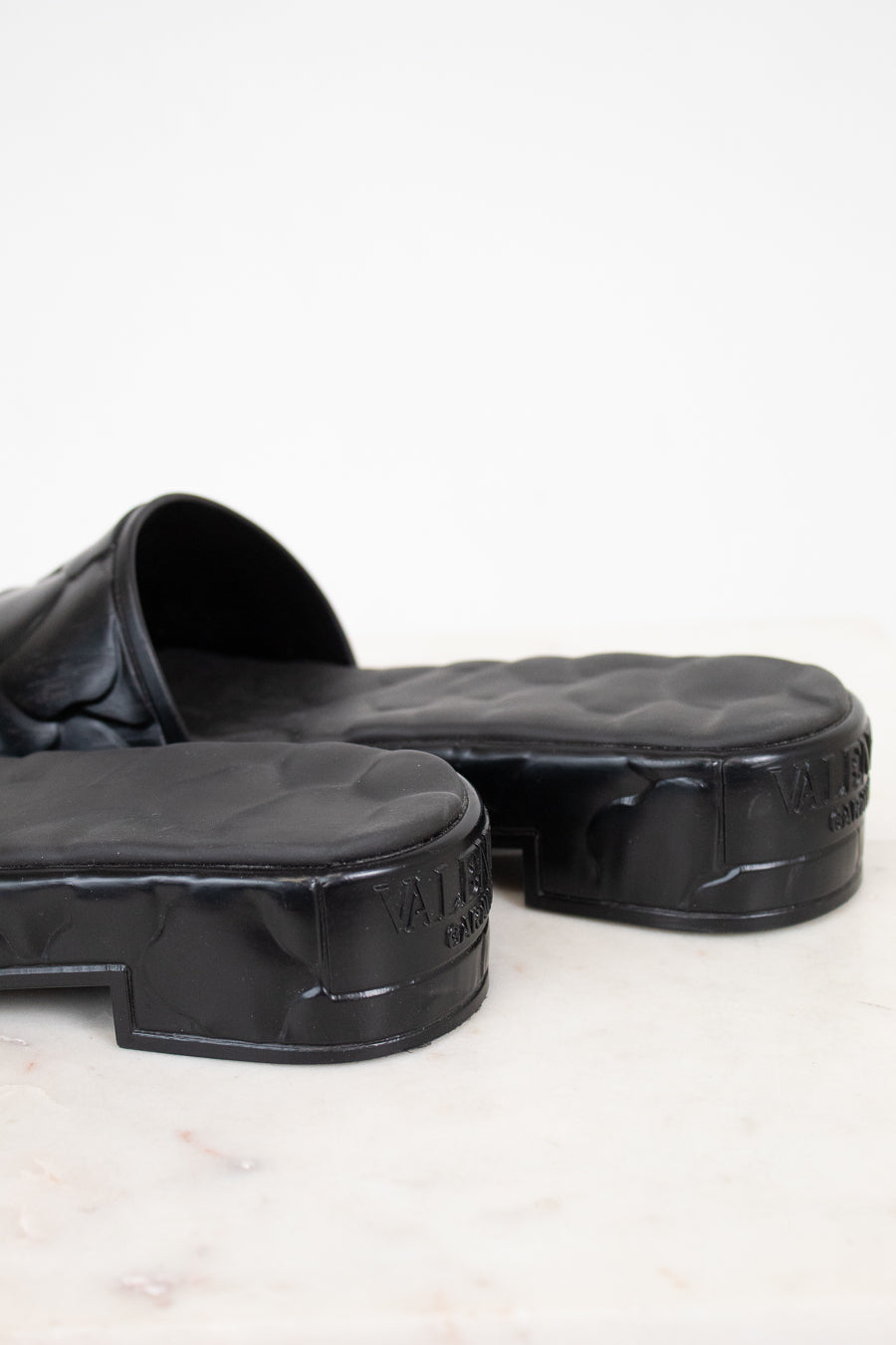 Black platform slides on a white background