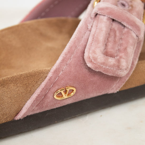 Pink velvet with close-up visible 'Valentino' logo