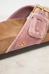 Pink velvet with close-up visible 'Valentino' logo