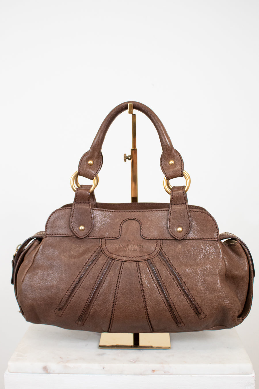 Brown handbag on a white background