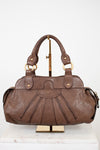 Brown leather handbag on a white background