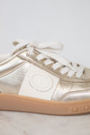 Close-up of cream Valentino logo
