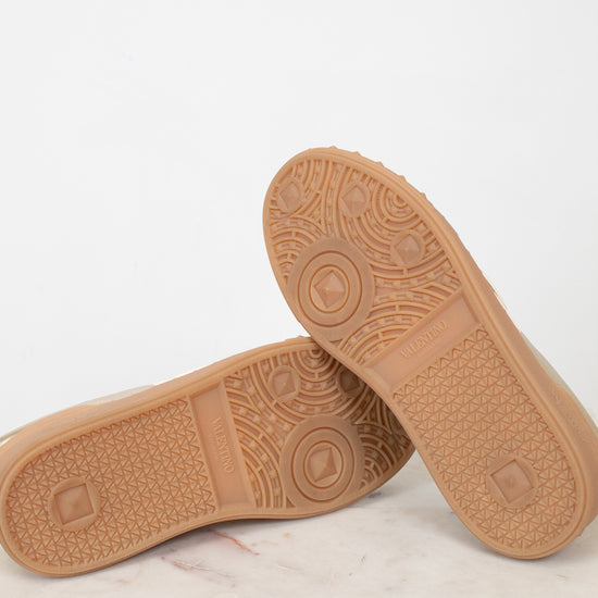 Bottoms of gum sole sneakers