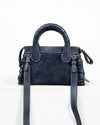 Blue handbag with a strap on a white background