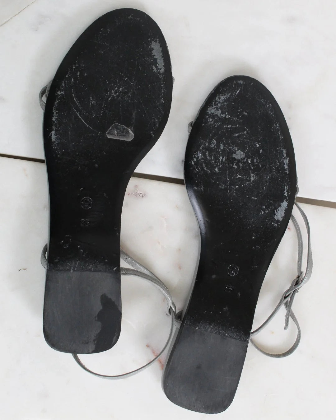 Black soles on a white background
